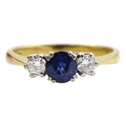 18ct gold three stone round sapphire and diamond ring, London 1988, total diamond weight approx 0.30 carat