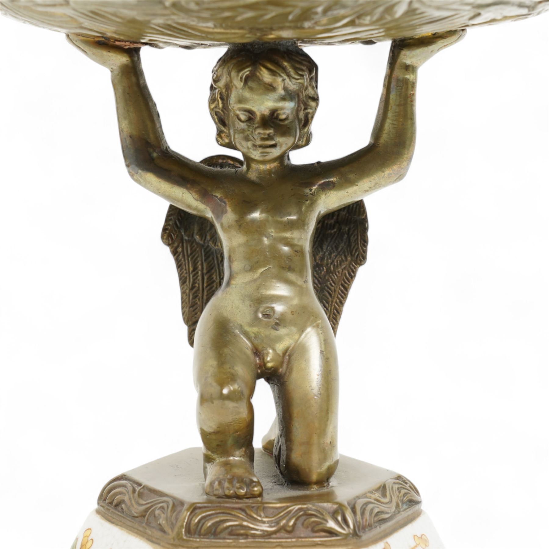 Wong Lee comport, with polychromatic enamel floral decoration, the stem formed as kneeling cherub, marked to base, H37cm 