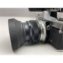 Four Olympus camera bodies, including Olympus OM10, serial no 20744269, with 'Olympus OM-System Zuiko Auto-S 50mm 1:1.8' lens serial no 3633644, Olympus OM-2 camera body serial no 460280 with 'Olympus OM-System G.Zuiko Auto-s 1:1.4 f=50mm' lens, serial no 729750, etc 