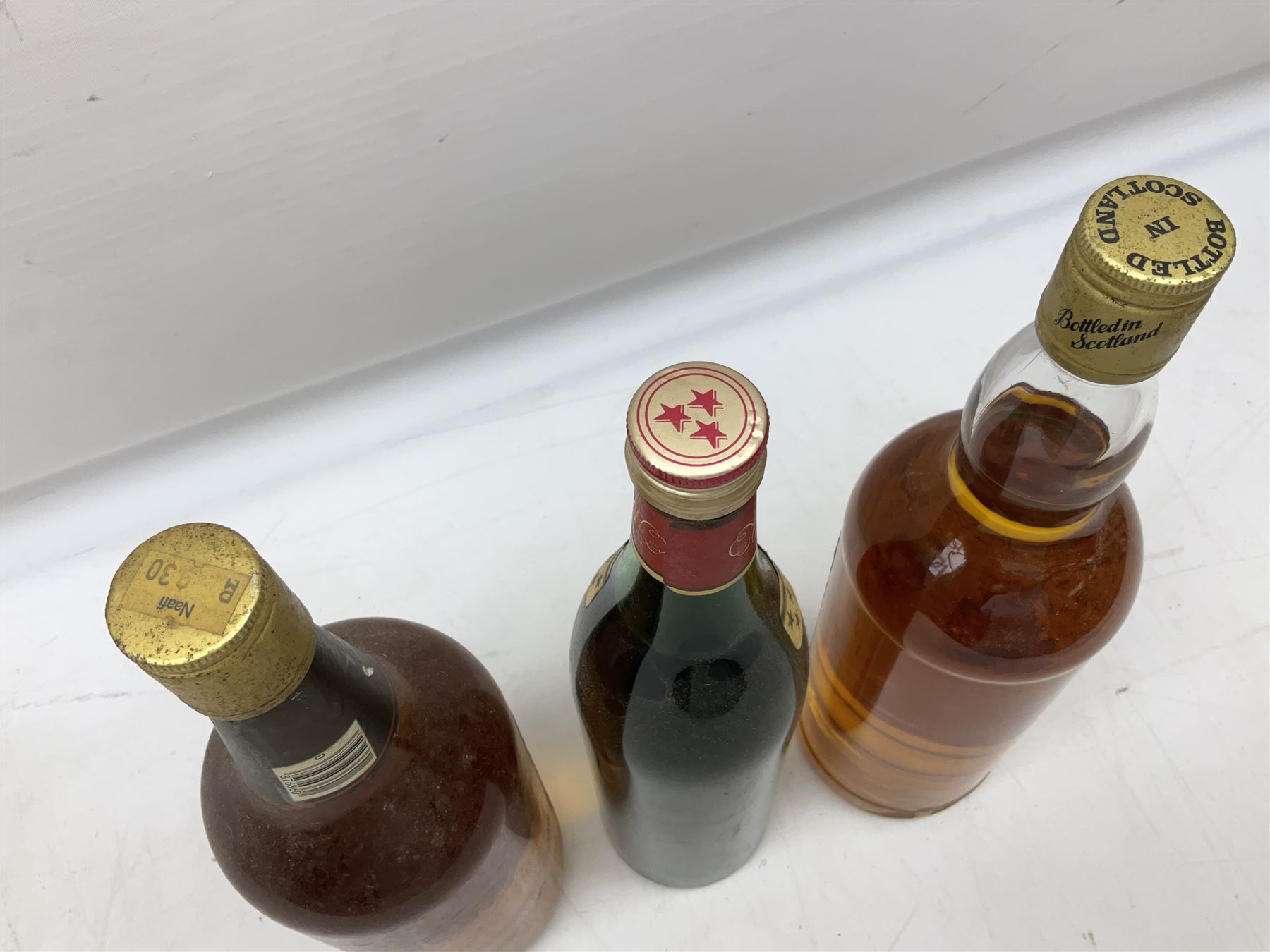 Mixed alcohol including, Carte Noire Cellien des Dauphins 1990 red wine, 75cl 13.5% vol, Dujardin Golden Keys blended grape brandy, contents and unknown proof, Special Reserve fine Scotch whisky, 1l, 43% vol and two others of various contents and proof 