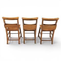 Country pine draw leaf table, bench seat and six chapel chairs, the top of plank construction, with two frieze drawers, additional leaves extending to 320cm, with bench seat and six elm chapel seats