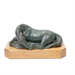 Mid-20th century painted terracotta figure of a recumbent horse, including wooden plinth W31cm