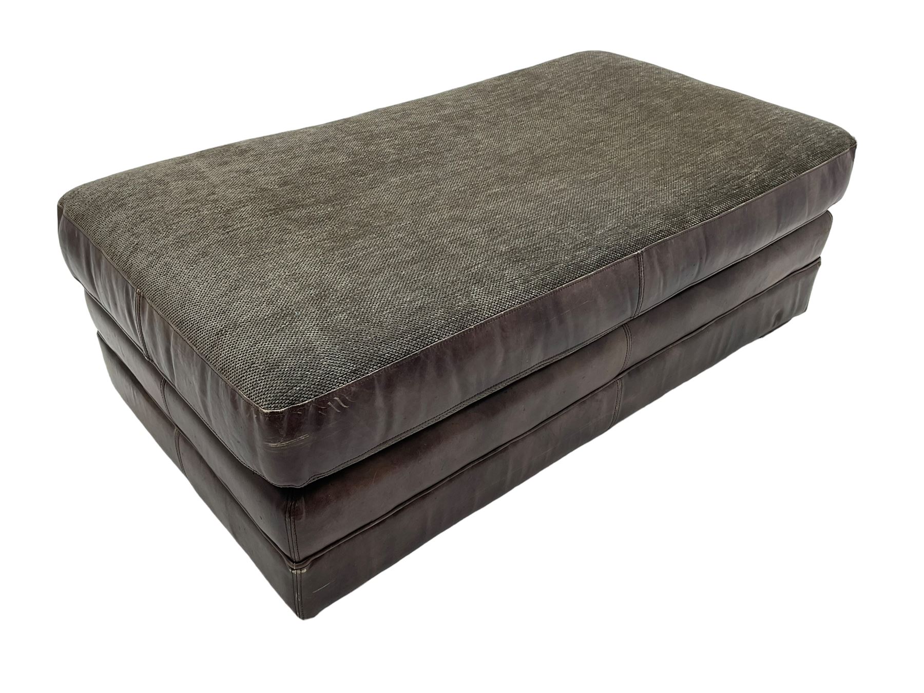 Large Knole design three-seat sofa upholstered in brown leather with scatter cushions upholstered in contrasting striped and Union Jack patterned fabric, on block feet (W210cm, H100cm, D102cm); together with matching rectangular footstool (135cm x 75cm, H45cm)