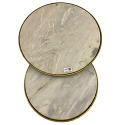 Two contemporary nesting side tables, circular gilt metal frames with white marble tops 
