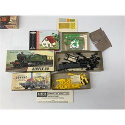 '00' gauge - over twenty construction kits by Airfix, Playcraft, Faller etc including windmills, Railbuses, lamps, locomotive, wagons, houses, fences, signal gantries, girder bridge, level crossing etc; all in original boxes or bags