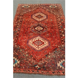  Persian red ground rug, three medallions, floral field, 300cm x 205cm  