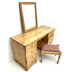 Solid pine twin pedestal dressing table, eight drawers, turned supports (W127cm, H77cm, D49cm) with wall mirror and stool (3)