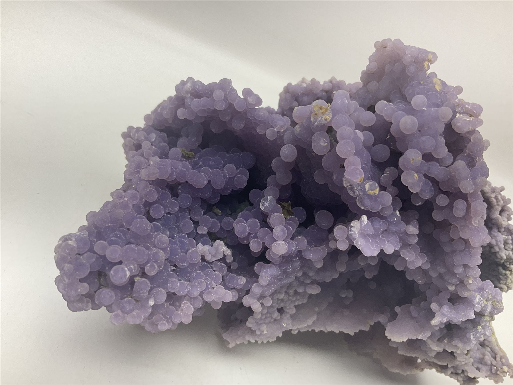 Grape agate cluster, formed of spherical quartz crystals, in purple tones, H15cm, L20cm