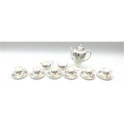 Wedgwood Hathaway Rose pattern coffee set for six, comprising coffee pot, cream jug, open sucrier, six coffee cans and six saucers. 