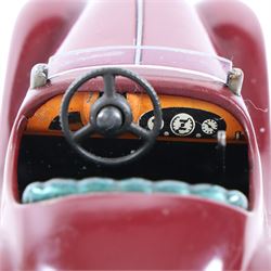 Schuco Akustico 2002 tinplate clockwork car, in burgundy with green metallic interior, with key