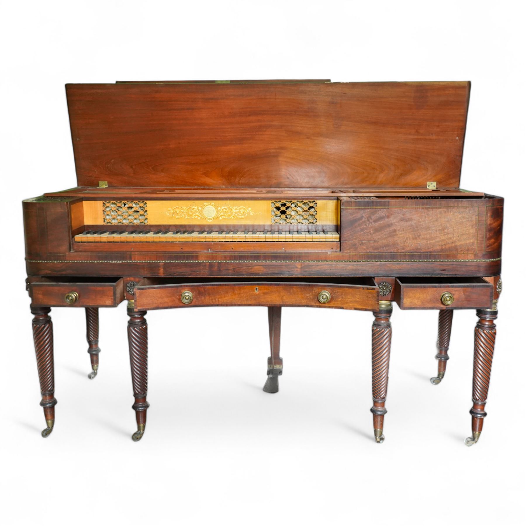 Early 19th century George IV Square Piano by William Rolfe & Co, 112 Cheapside, London, c1821. Mahogany veneered case with rosewood crossbanding and brass stringing, with sustain pedal and reeded legs on a tapered spiral with brass capitals, with three music draws beneath and a folding duet music stand, nameboard with makers name on a round gilt medallion and open silk backed fretwork to the ends, serial No 6699, double strung, English double action with 68 ivory and ebony keys, F1-C7. original strings, hammers and dampers, soundboard and bridge in good condition, with original makers written instructions on regulating the action and tuning the piano attached to the inside of the instrument. In good condition, however the action is in need of regulation and tuning.
William Rolfe is thought to have been in business between 1785 and 1828. 
Given the intricate nature of these historic instruments, specialist support will be available if required, to assist successful buyers with safe removal and onward handling. Price upon application.


This item has been registered for sale under section 10 of the APHA Ivory Act Reference PB6GL6SZ