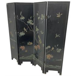 Chinese four-panel folding room screen, black lacquered with a naturalistic scene decorated with trees, birds and flowers