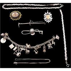 Silver charm bracelet, silver jockey hat and crop brooch, spur and crop brooch, silver fob and chains and a gilt micro mosaic brooch
