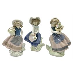 Lladro Flower Girl set, comprising Sweet Scent no 5221, Pretty Pickings no 5222 and Spring Is Here no 5223, all with original boxes, largest example 18cm