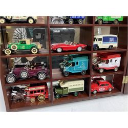 Collection of die-cast vehicles to include Corgi, Dinky, Lledo and Days Gone, housed in six wood display units
