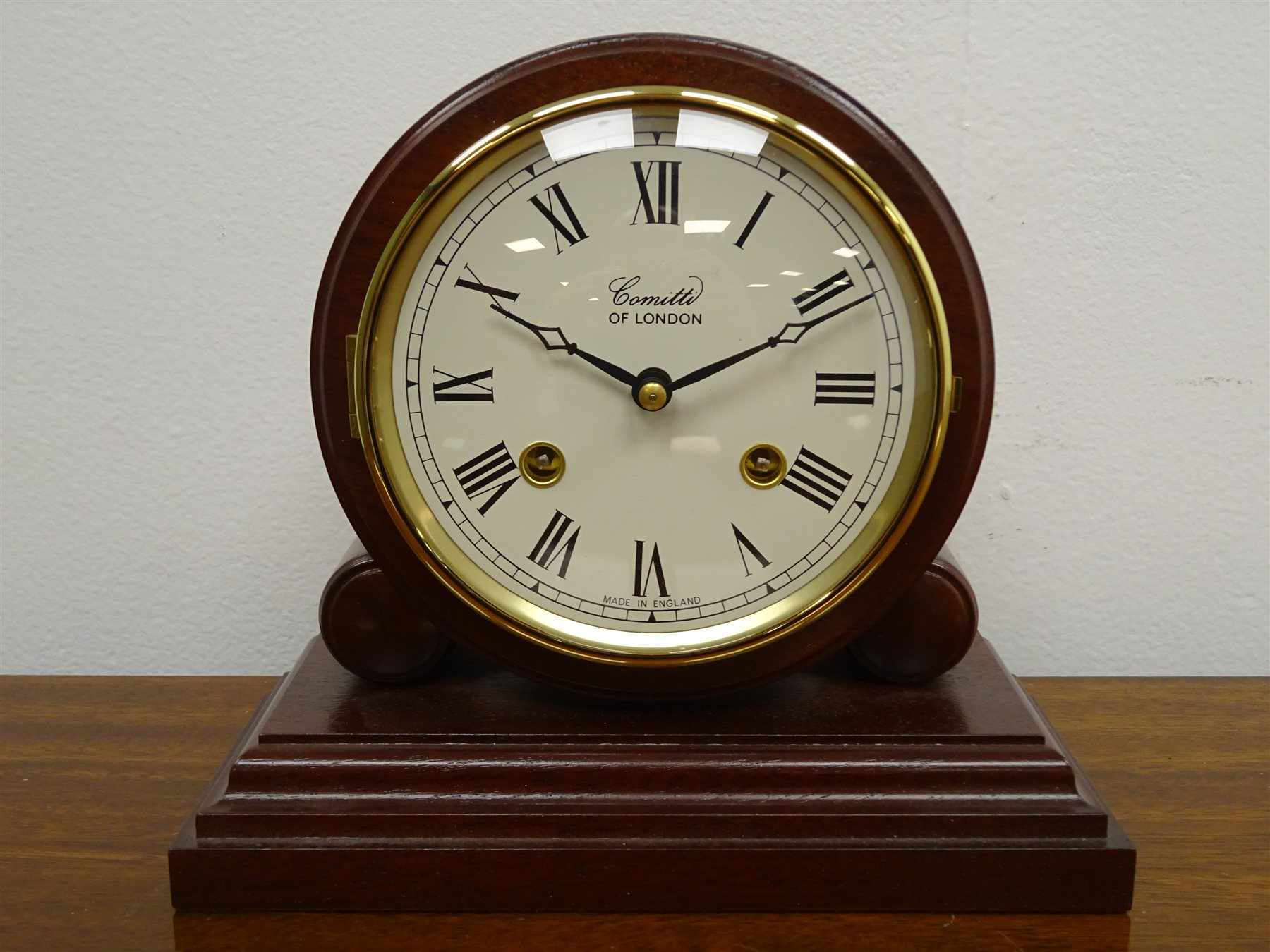 Comitti Regency style mantel clock, drumhead dial striking the half hours on a bell, No.20227