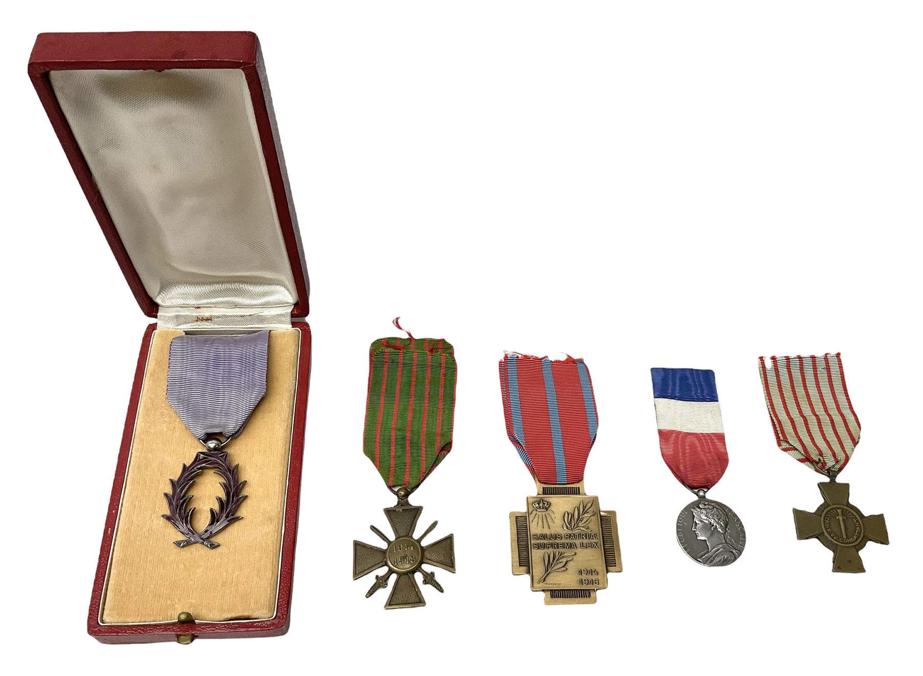 Five continental medals - WW1 Belgian Cross of Fire; WW1 French Croix De Guerre; French Croix De Combattant; French Republic Workers silver merit awarded to L. Mounet 1950; and boxed French Palmes Universitaires Officier d'Academie silver and enamel wreath (5)