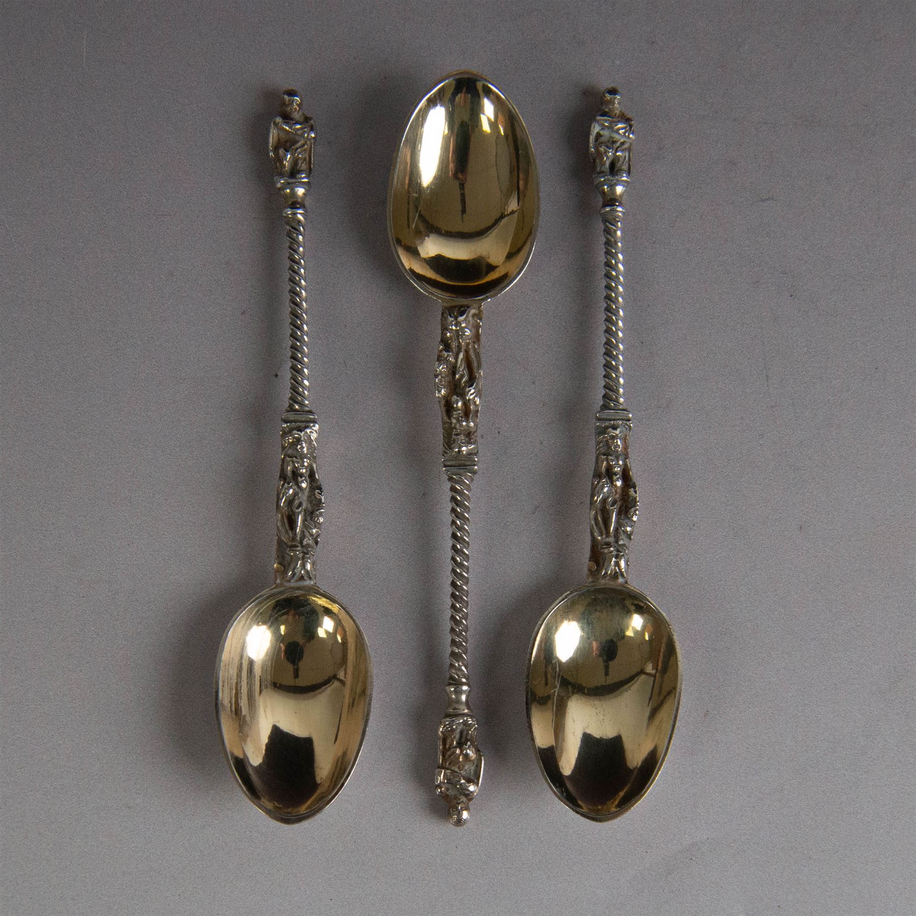 Set of six late Victorian silver apostle spoons and sugar tongs, hallmarked Robert Stebbings, London 1897, in fitted cased with silk and velvet lined interior