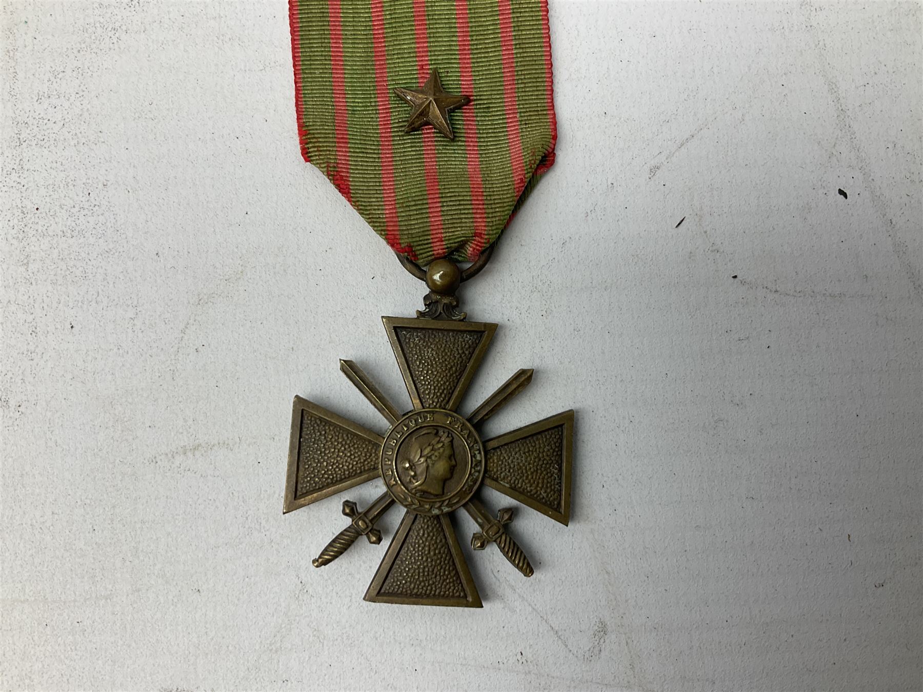 Five continental medals - WW1 Belgian Cross of Fire; WW1 French Croix De Guerre; French Croix De Combattant; French Republic Workers silver merit awarded to L. Mounet 1950; and boxed French Palmes Universitaires Officier d'Academie silver and enamel wreath (5)