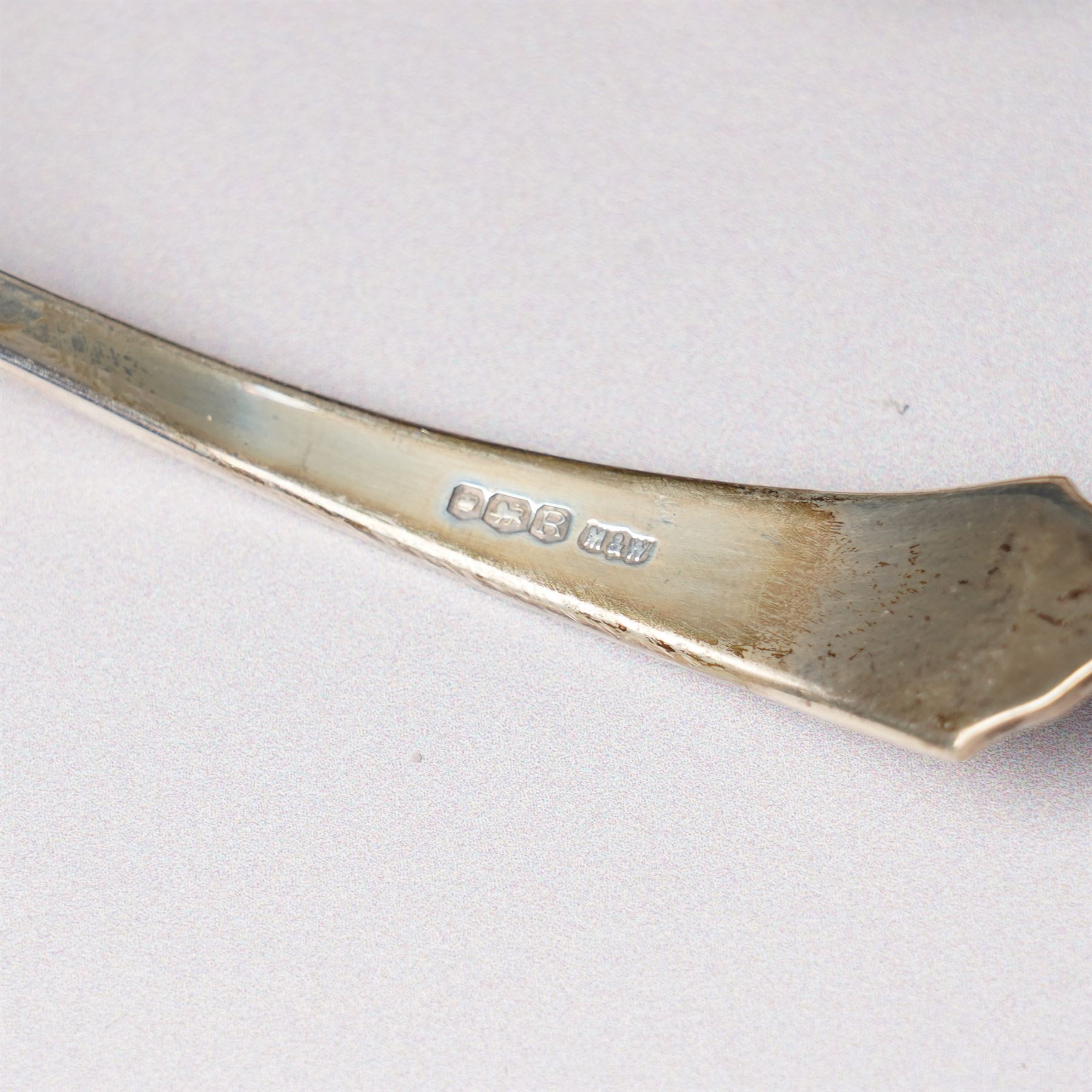 Tiffany silver teething ring marked 'Tiffany sterling 925', boxed, Junghans bedside clock in silver mounted frame, pair of silver sauce ladles and a silver knife