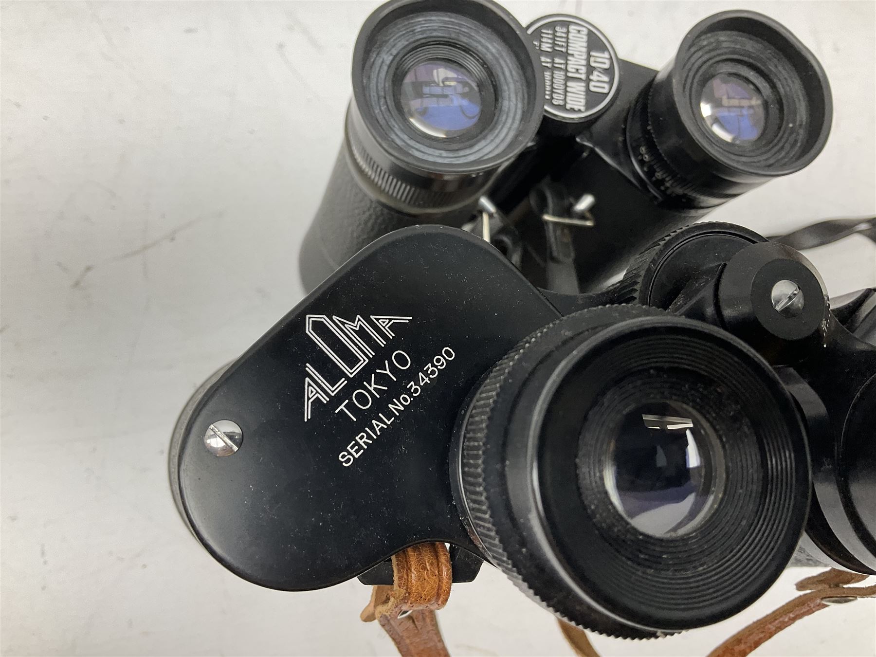 Nine cased pairs of binoculars, to include Embassy 8x40, Tasco 7x35, Zenith 10x50 Field. Opticron 10x50, Swift 8x40 Grand Prix Mk I, etc