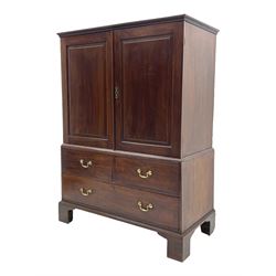 George III mahogany press cupboard on chest, projecting moulded cornice over two panelled doors, the interior fitted with hanging rail and two slides, the chest fitted with two short and single long drawer, on bracket feet 