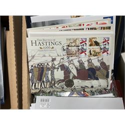 Approximately one hundred and fifteen Royal Mint coin covers, in two ring binder folders and loose, together with approximately 53 grams of Great British pre-1920 and approximately 68 grams of Great British pre-1947 silver threepence coins, and a small quantity of further pre-decimal coins