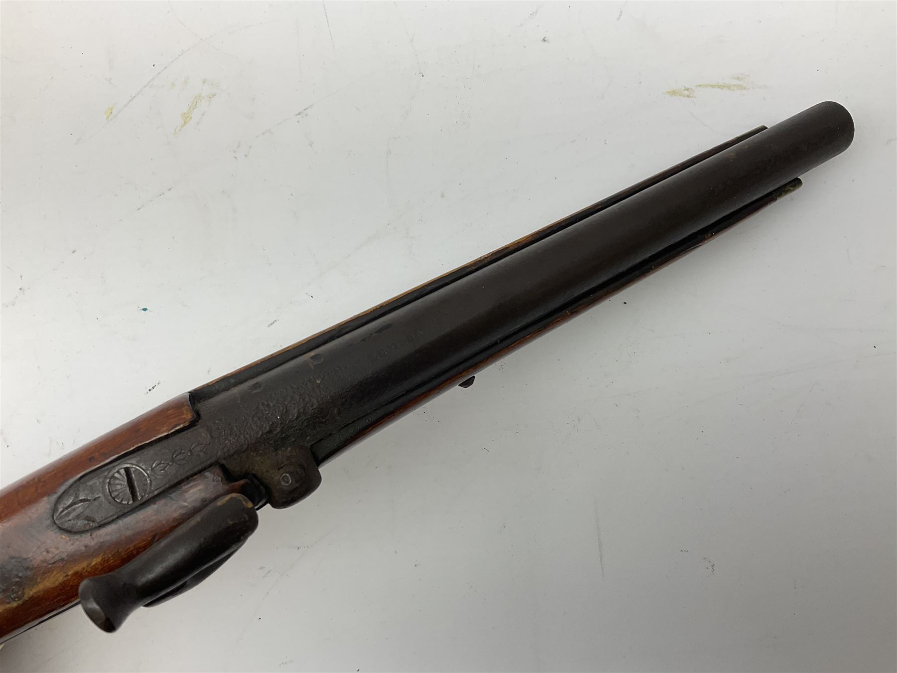 Re-manufactured percussion converted from flintlock single barrel pistol, the 20cm barrel with ramrod under, reused back action lock, brass furniture and hardwood stock L41cm overall