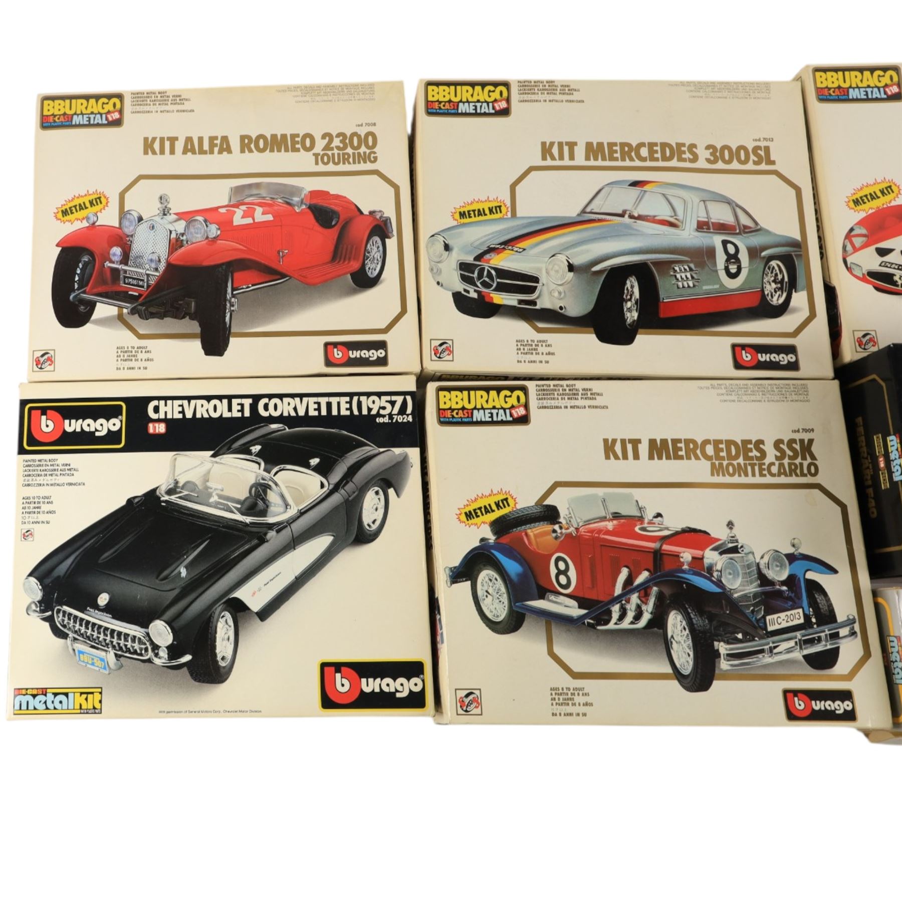 Five Bburago kit built cars and two Bburago diecast models