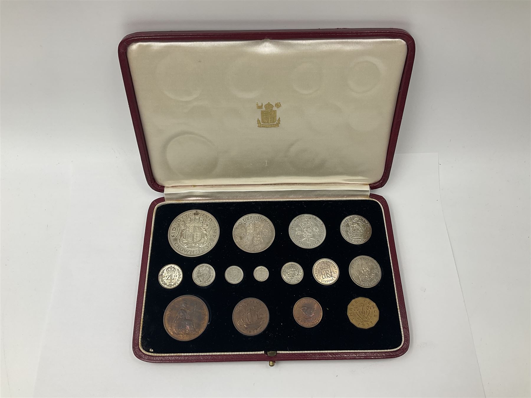 King George VI 1937 fifteen coin specimen set, housed in the official The Royal Mint maroon and gilt case