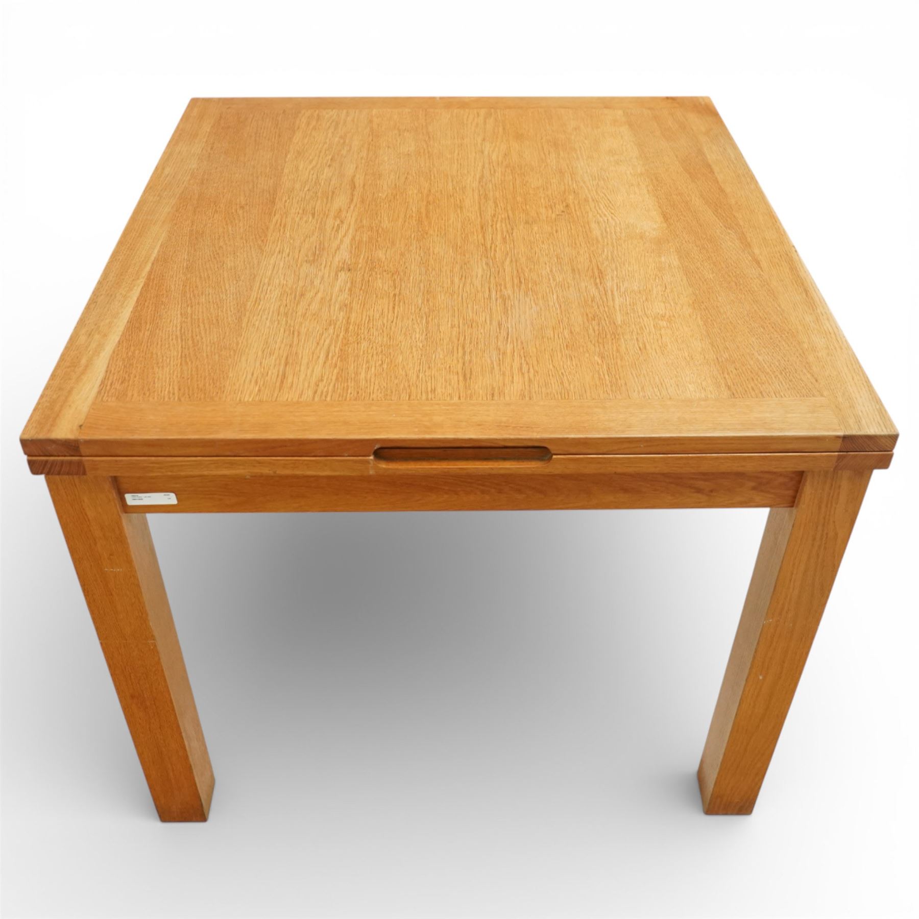 Laura Ashley - extending oak dining table, rectangular top with sliding hinged leaf, raised on square section legs