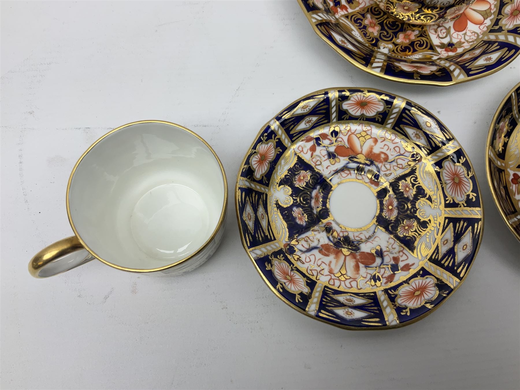 Six Royal Crown Derby cups and saucers all in imari pattern 2451, in various shapes  