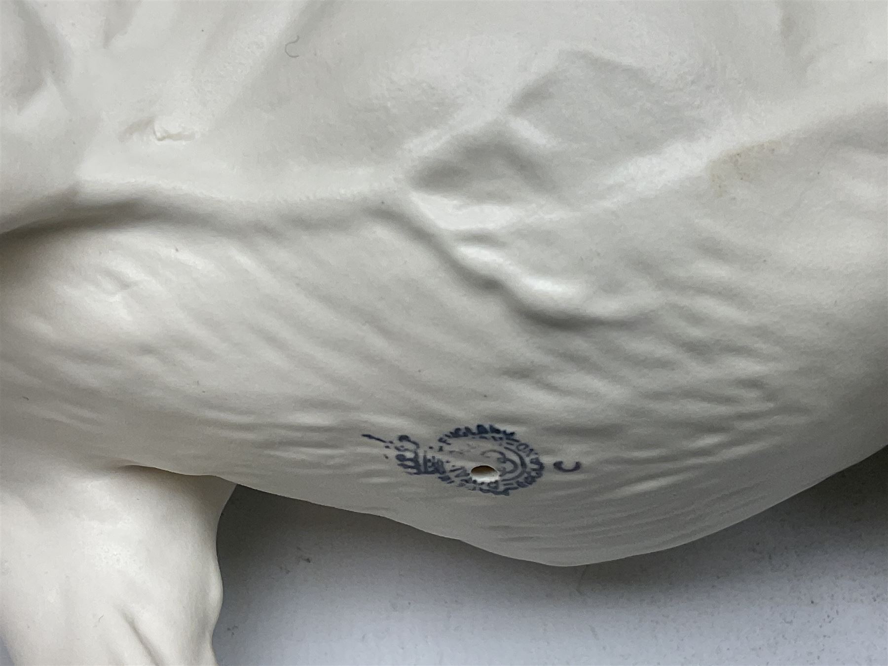 Five Beswick and Royal Doulton horse figures in matt white on black plinths, comprising of  Spirit of Affection no. 2689/2536, Springtime no.2837, Spirit of peace no.2916, Spirit of earth no.2914 and Spirit of the wild no. 183, together with a composite figure of a horse (6)