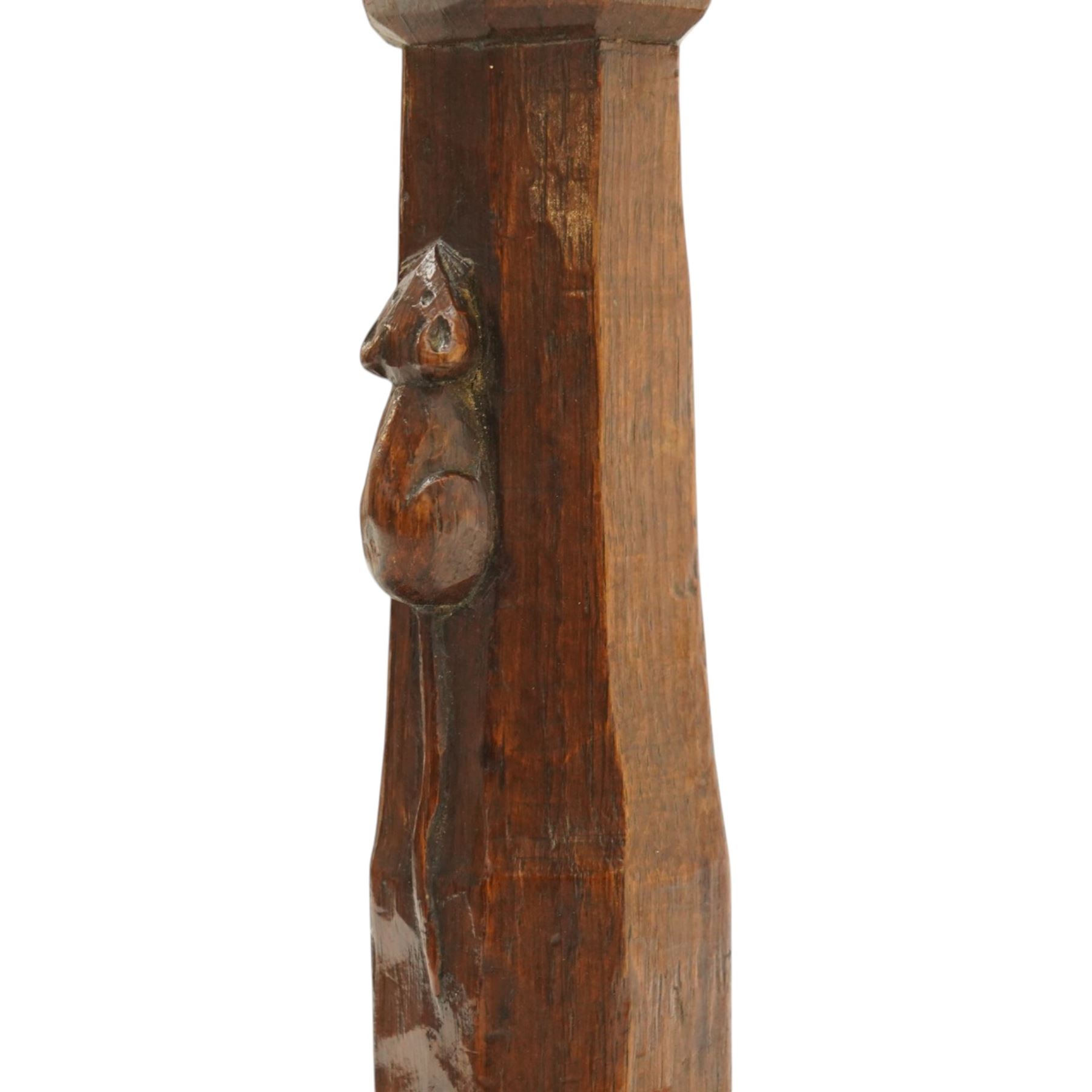Mouseman - 1940s dark oak dressing table stool, the rectangular top with deep-tan leather seat, raised on octagonal supports united by box stretcher, with carved mouse signature, by the workshop of Robert Thompson of Kilburn