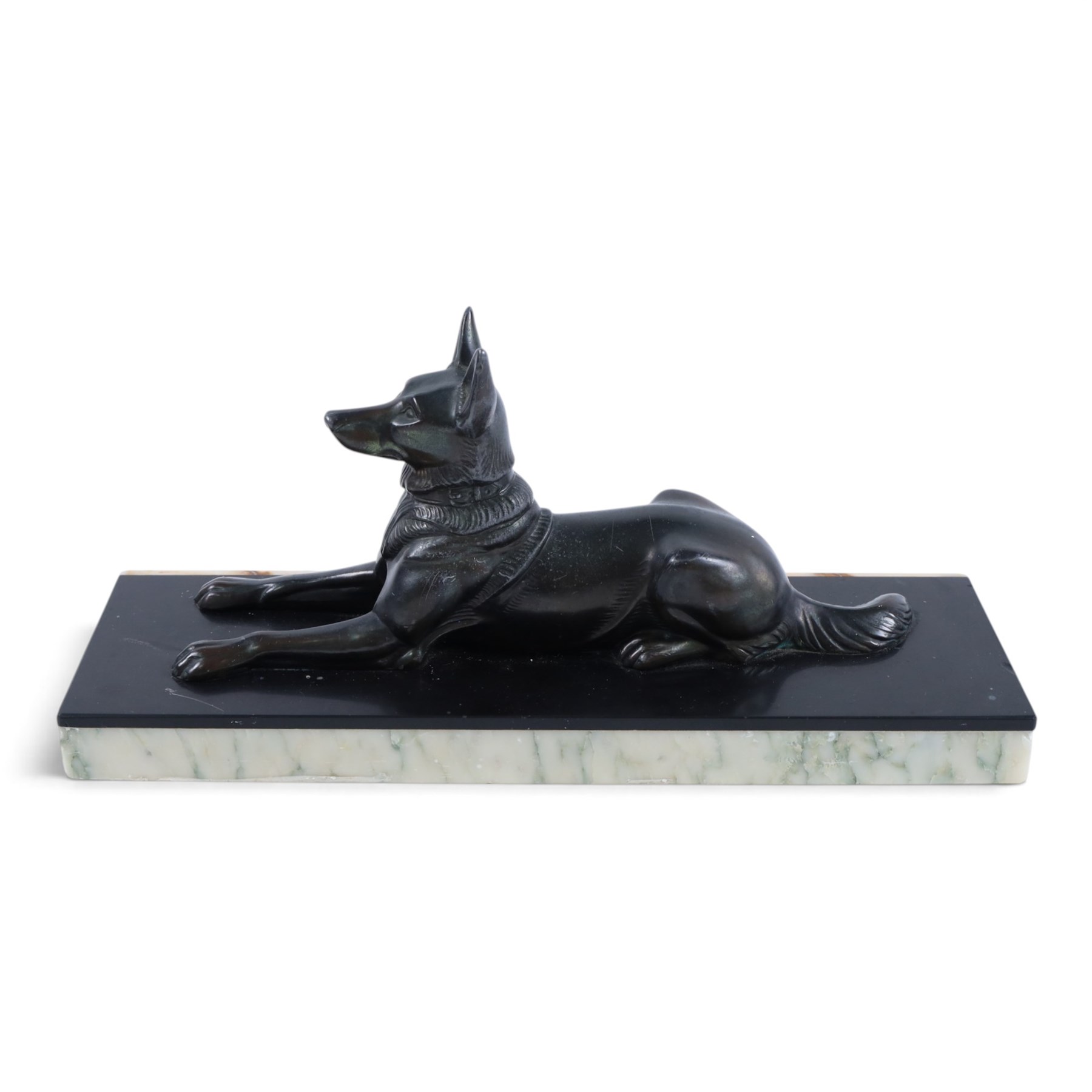 French Art Deco spelter figure of a recumbent dog on marble and onyx plinth, H14cm, L30cm