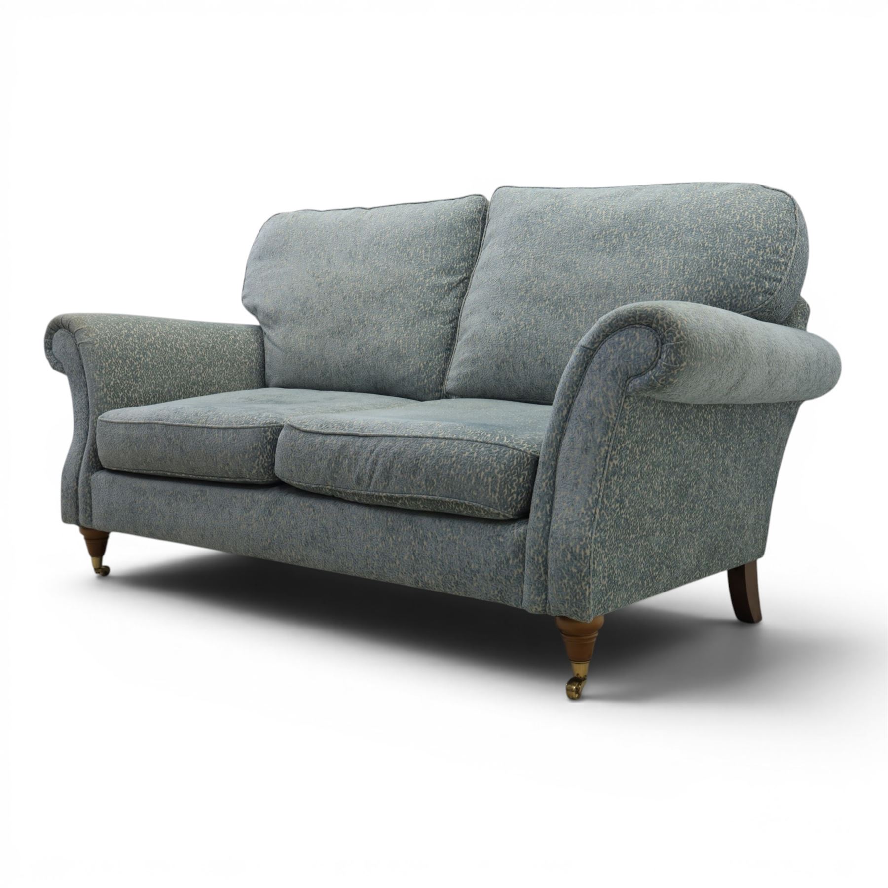 Marks & Spencer - 'Salisbury' two seater sofa, upholstered in blue fabric, scrolled arms and loose cushions
