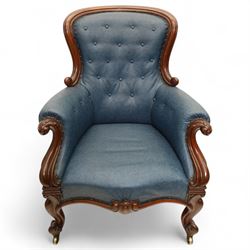 Fine pair of mid-19th-century mahogany library armchairs, carved frame with balloon-shaped back with scrolled ends, rolled wide arms, ending in a scrolled volute above a serpentine seat rail, upholstered in mottled turquoise faux leather, button upholstered back, arms, and cushion seat, studded sides and apron, raised on scroll carved front feet and splayed rear legs on castors 