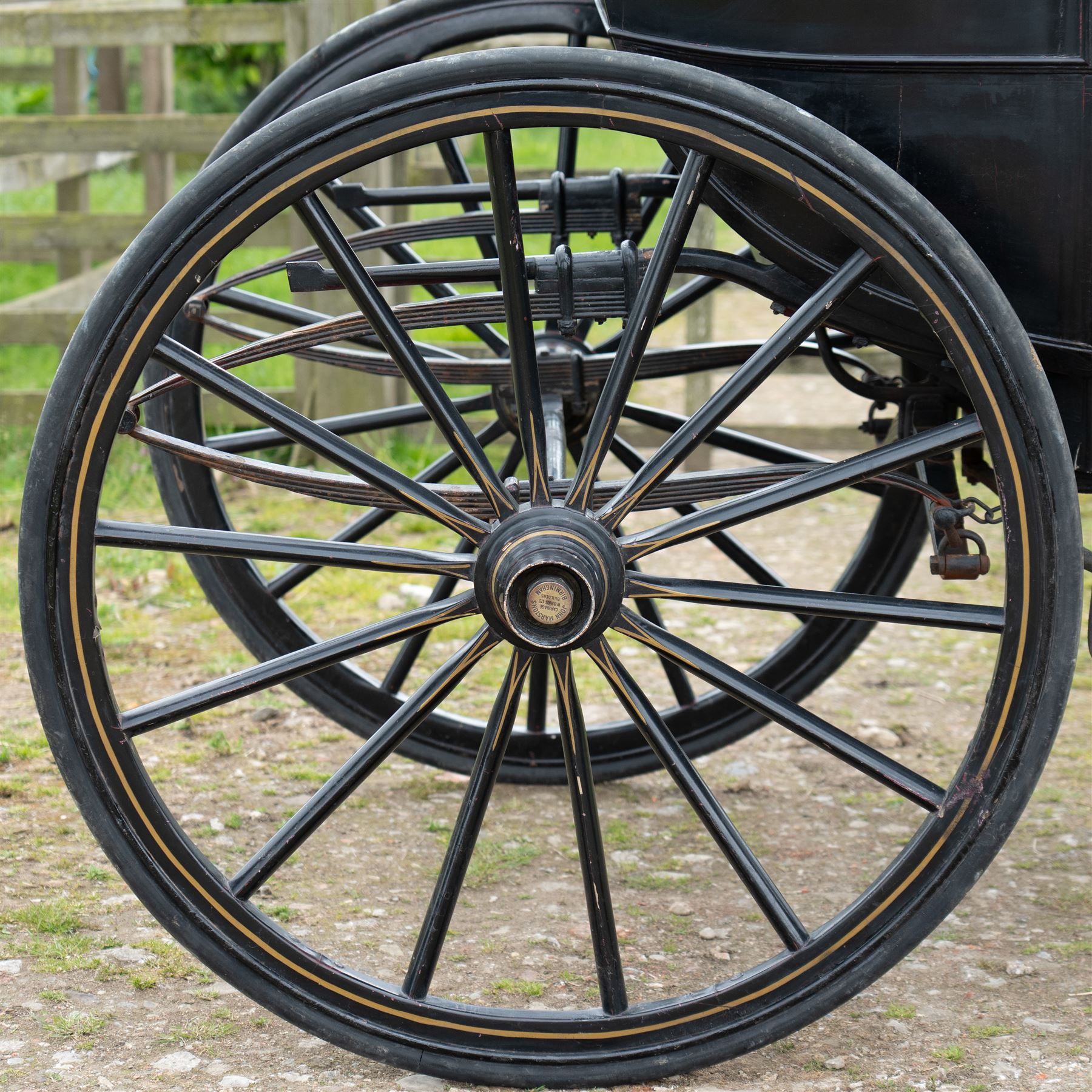 Town Coach by John Marstons Birmingham - Ex Film

A black painted five glass Town Coach by John Marston's Carriage Works Ltd, Birmingham, with enclosed glazed passenger compartment, curved front glass, external coachman's box seat and pole for driving with a pair of horses. The carriage has a timber coach body with buttoned black leather interior, blue upholstered seat cushions, plated exterior door handle, maker plates to the body and step, and John Marston marked hub caps. Mounted on black painted wooden spoked wheels with rubber tyres, leaf spring suspension, underbody turntable steering and iron fittings throughout.
Featured on the film set of 'Victoria' with Jenna Coleman

Features

• Black painted enclosed coach body
• Glazed passenger compartment with five windows
• Curved front glass
• Buttoned black leather interior
• Blue upholstered seat cushions
• External coachman's box seat
• Timber coach body
• Wooden spoked wheels
• Rubber tyres
• Leaf spring suspension
• Underbody turntable steering
• Pole for pair of horses
• Iron foot steps
• Plated exterior door handle
• Maker plates for John Marston's Carriage Works Ltd, Birmingham
• John Marston marked hub caps
• Featured on the film set of Victoria with Jenna Coleman

Dimensions:
Overall length: 390 cm
Width: 190 cm
Height: 214 cm

Wheel Diameters:
Front wheels: 104 cm
Rear wheels: 134 cm

Seating:
Coachman's box: 2
Passenger compartment: 4