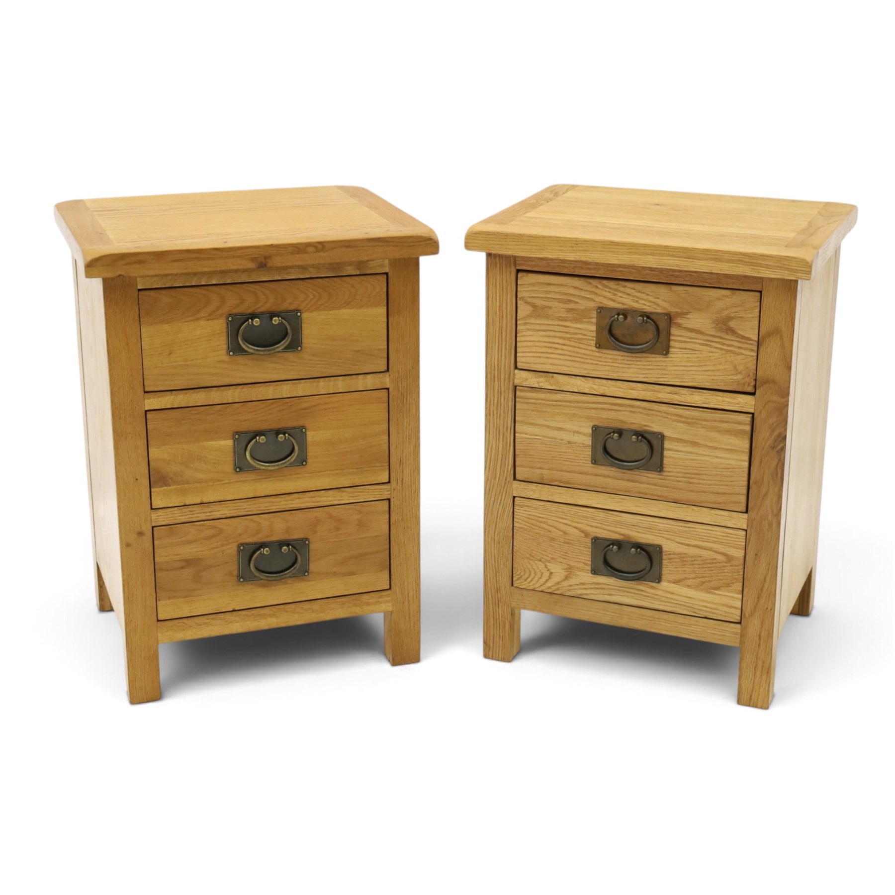 Pair of solid light oak bedside chests, rectangular top over three graduating drawers with metal handles and plates, on square feet