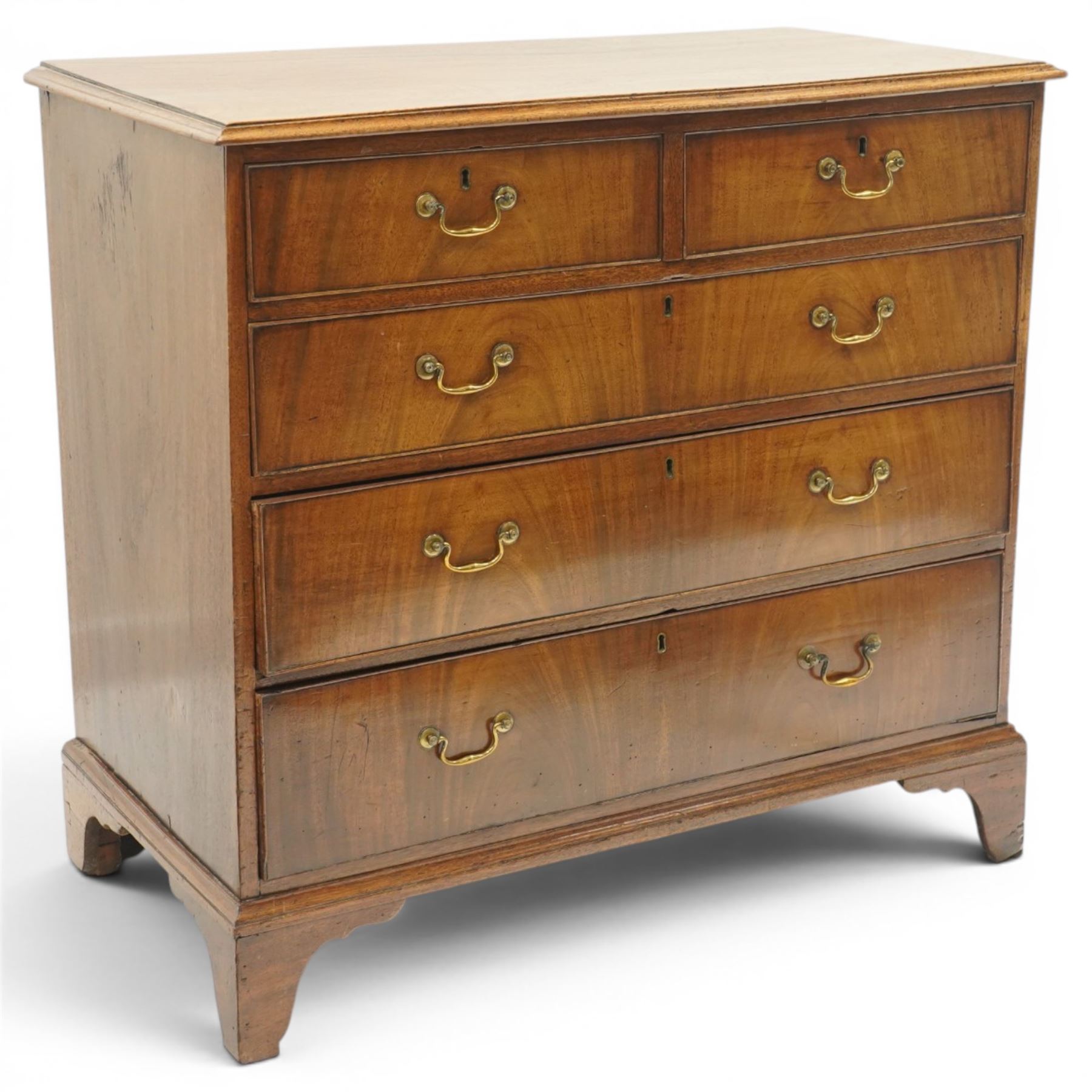 George III mahogany straight-front chest, rectangular top with moulded edge, over two short and three long graduating cock-beaded drawers, each with original brass swan neck handles, lower moulded edge on bracket feet