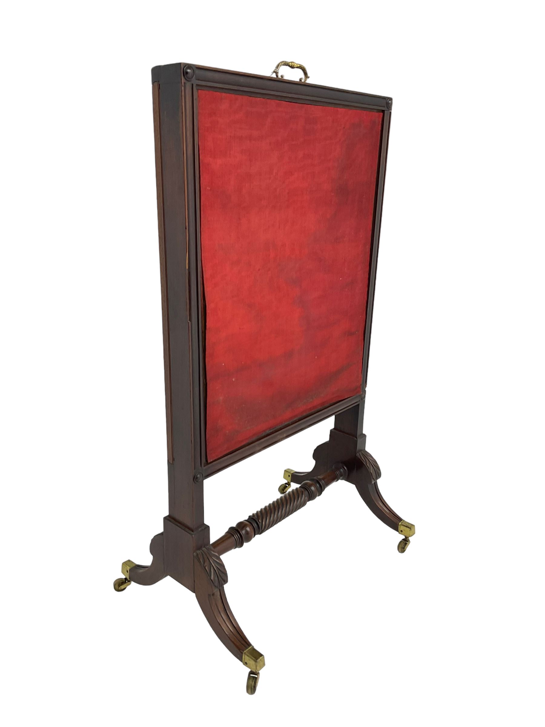 Regency mahogany screen with two horizontal and one vertical pull-out panels, on base with carved sabre legs and rope-twist stretcher