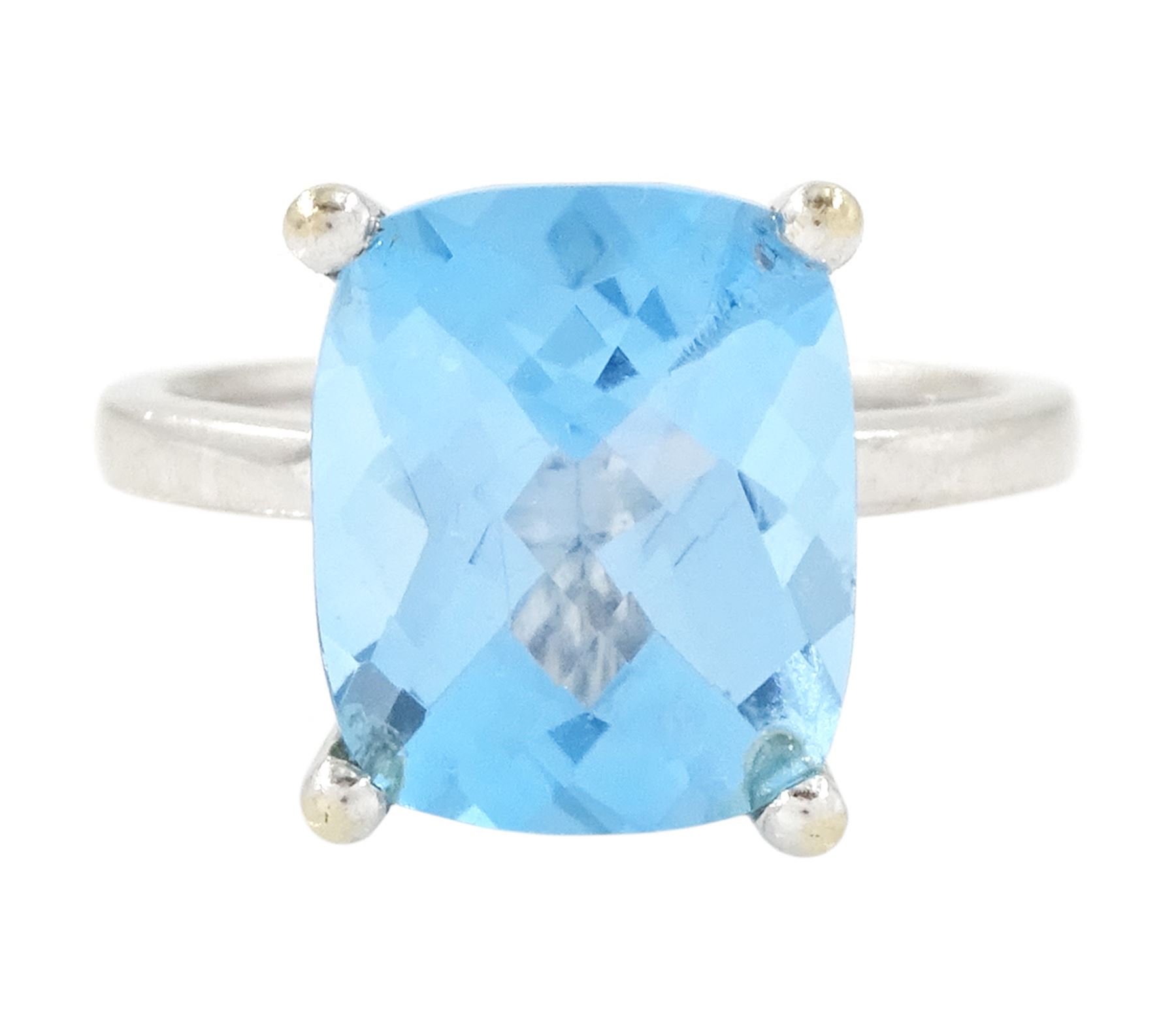 18ct white gold blue topaz ring, four claw set with a single cushion briolette cut Swiss blue topaz, hallmarked