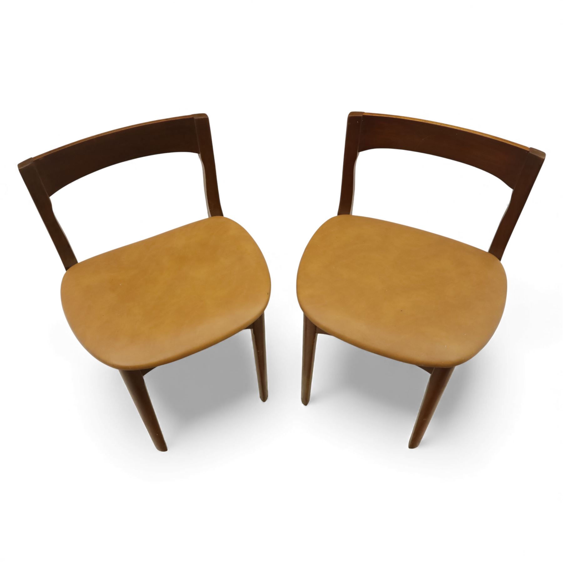 Mid 20th century living room furniture, comprising of a pair of Nathan teak dining chairs, each with curved open backrests and shaped seats, together with a Danish teak coffee table, rectangular top inset with decorative ceramic tiles, on square tapered supports
Chairs (H 73cm, W 48cm)
Table (H 41cm, W 81cm, D 47cm)