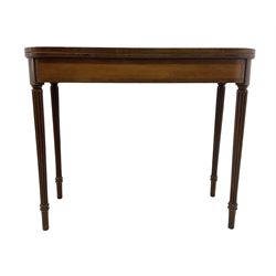 Early 19th century tea table, rectangular fold-over top with rounded corners, the frieze and sides inlaid with satinwood panels, double gate-leg action base, on reeded supports 
