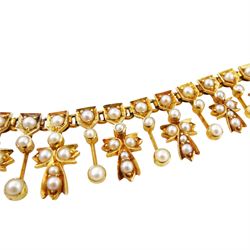 Edwardian 15ct gold split pearl fringe necklace, thirteen graduating cross pendants, each spaced by pearl drops, the centre cross suspending an 18ct gold pearl star pendant, to a pearl set chain necklace, in silk and velvet lined case by Elkington, Glasgow