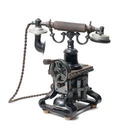 Early 20th century L M Ericsson & Co Skeletal table telephone, the earpiece impressed No.28, with black painted frame and possibly original wires, H29cm