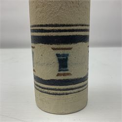 Troika cylindrical vase decorated with circles upon a striped backdrop, designed by Linda Taylor, with painted marks beneath, H14cm