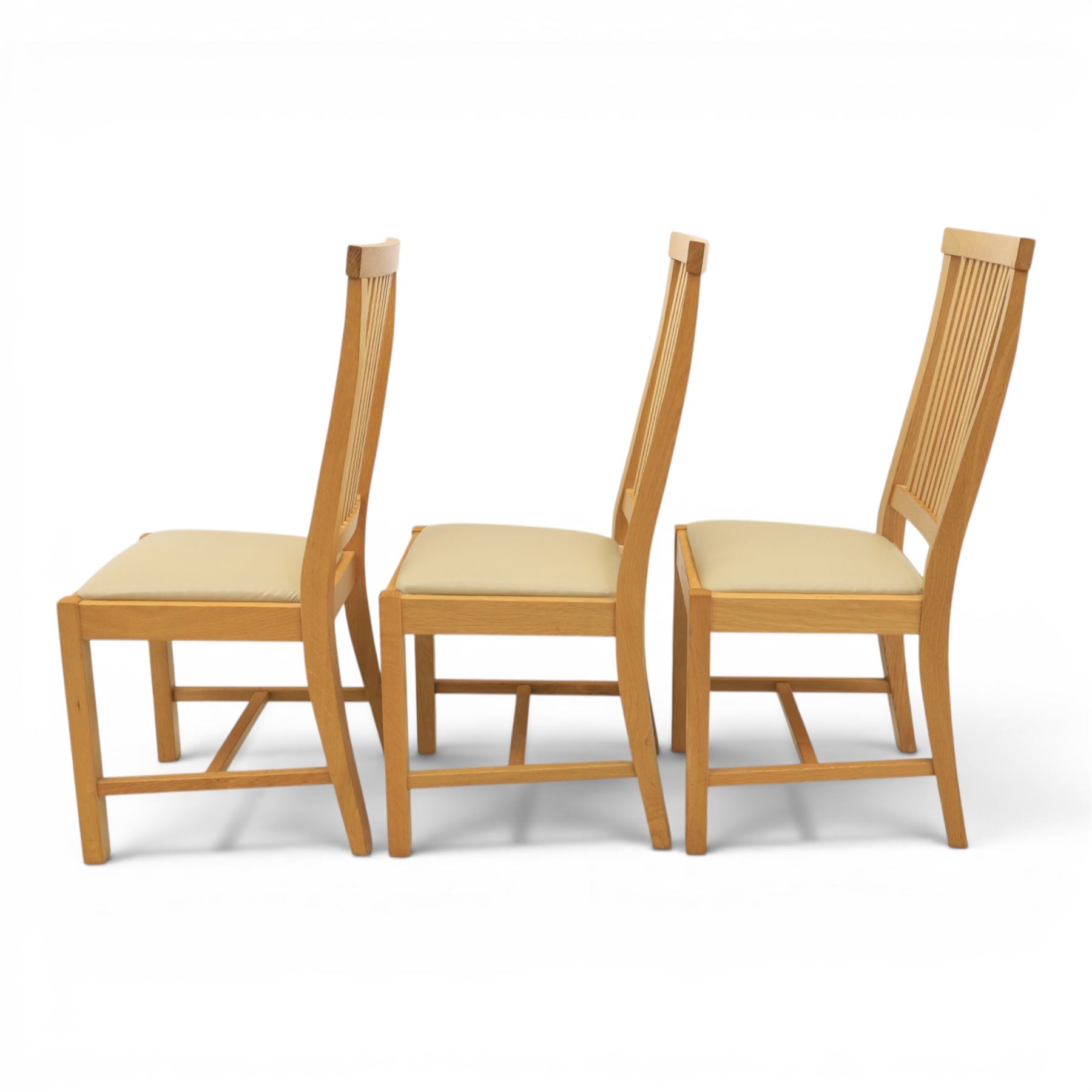 Contemporary oak dining extending table and set of six chairs, with additional leaf  extending to 182cm, chairs with cream upholstered seat