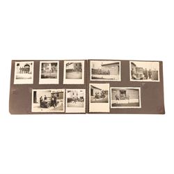WWII German Soldiers photo album, 1942, including photographs of soldiers in uniform posing during parade etc  