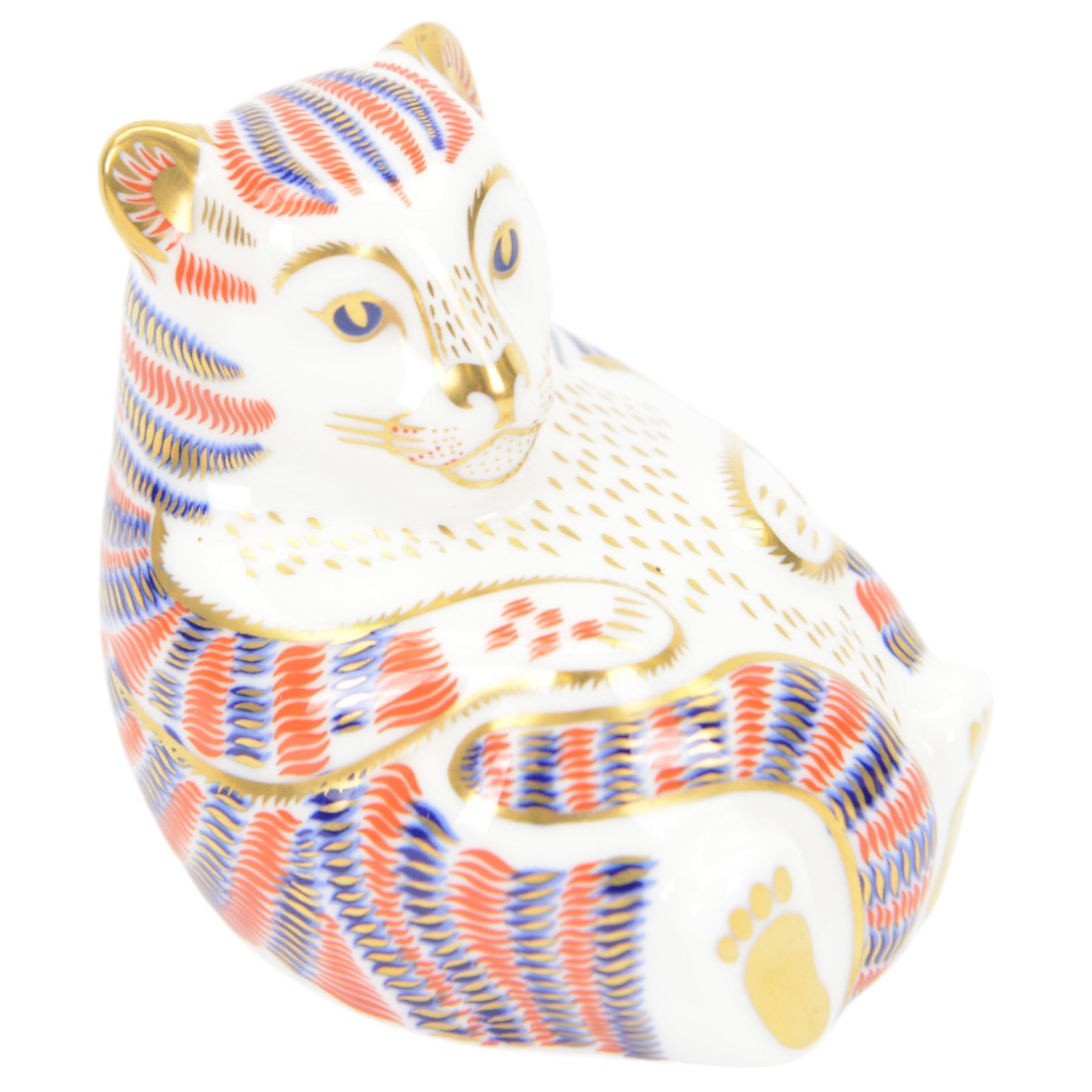 Four Royal Crown Derby paperweights, comprising Puffin, Squirrel, Badger, and Tiger Cub, each with silver stoppers